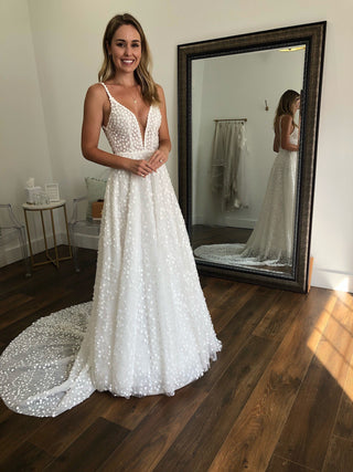 Custom champagne fit-and-flare wedding gown, featuring 3D floral embroidery, sweetheart neckline, and an off-the-shoulder design, perfect for glamorous and romantic bridal styles