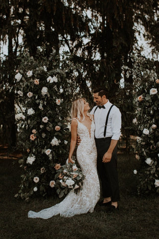 Romantic ivory tulle wedding gown adorned with lace applique, sweetheart neckline, and graceful puff sleeves, perfect for modern and enchanting bridal celebrations