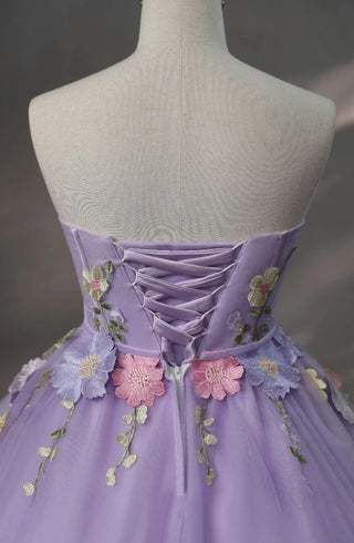 Romantic lilac tulle dress with blooming floral appliqués and a structured bodice for a graceful and captivating look