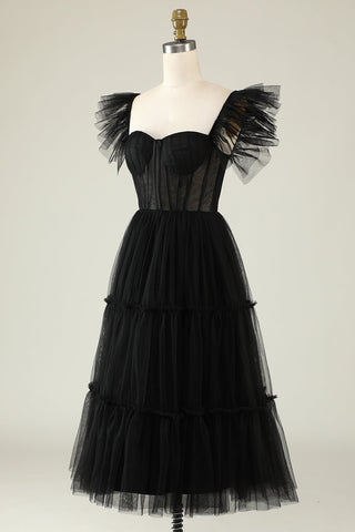 Elegant black tulle ball gown, featuring ruffles, a sweetheart neckline, and a lace-up corset back, tea-length design suitable for gothic prom nights and formal events