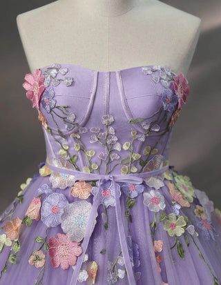 Stunning lavender gown with floral embellishments, ideal for formal events, proms, or whimsical weddings