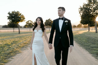 Elegant bridal dress with a sweetheart neckline, fitted bodice, and voluminous tulle layers, perfect for outdoor garden weddings.