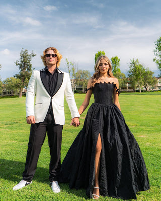 Chic black ball gown with crinkle satin fabric, lace strap accents, off-the-shoulder A-line silhouette, designed for gothic fairycore enthusiasts at prom or formal events