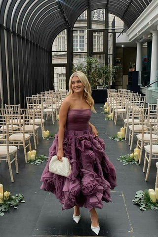 Elegant strapless purple party dress featuring layered ruffle details, A-line silhouette, and unique floral-inspired tulle design, ideal for weddings and evening occasions