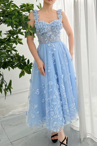 Elegant blue tulle gown with 3D floral embellishments, fitted bodice featuring intricate lace and silver embroidery, and a soft A-line silhouette, perfect for bridesmaids, formal events, or modern weddings