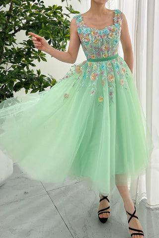 Elegant mint green tulle dress with intricate floral embroidery, perfect for spring weddings and garden parties